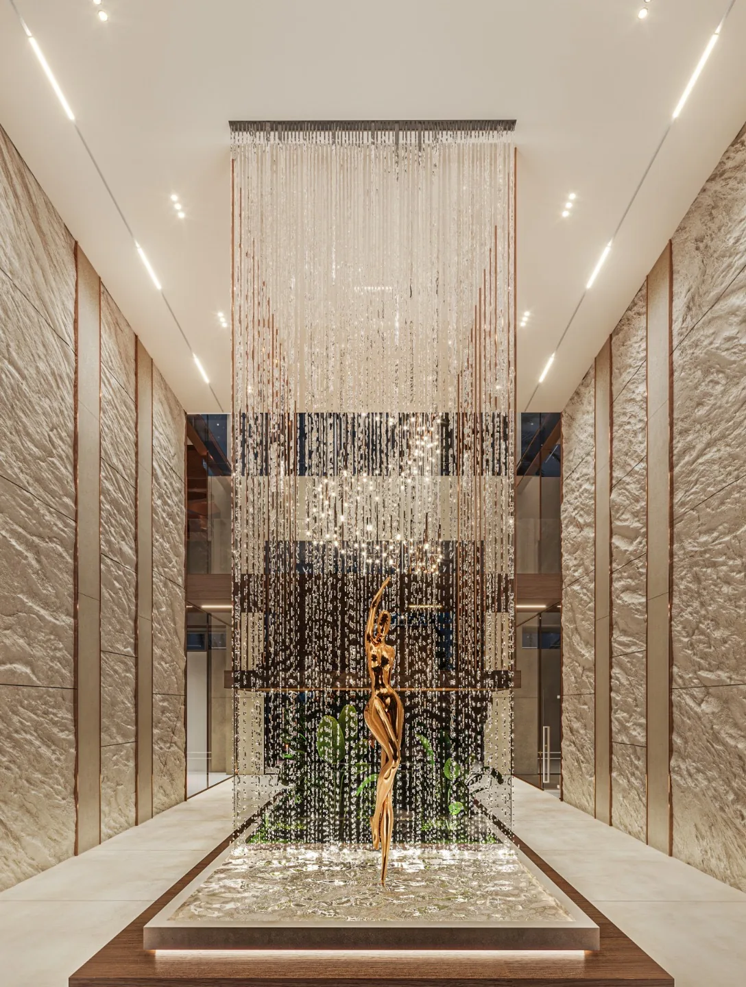 Modern lobby hallway with beaded chandelier and golden statue centerpiece.
